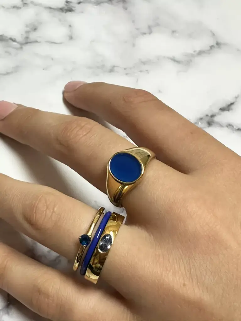 Charmins Ring - R1484 - Gold-Colored Signet Ring with Flat Oval Synthetic Blue Gemstone Steel